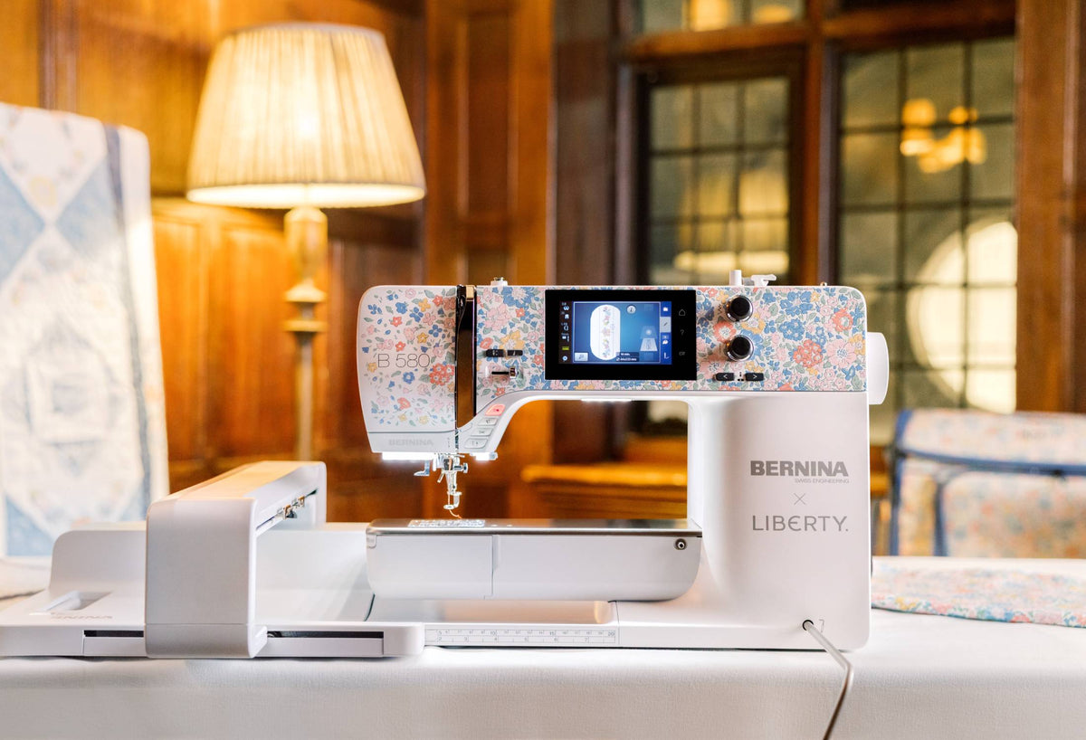 BERNINA 580 Liberty Edition - studio front view with embroidery module