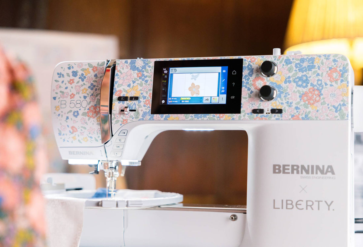 BERNINA 580 Liberty Edition - Liberty floral faceplate and touchscreen angled close-up