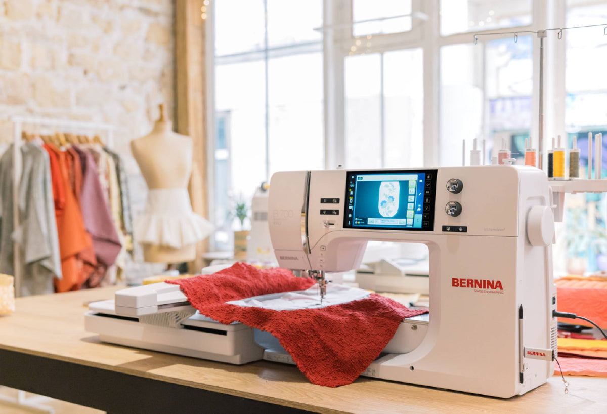 BERNINA 700 PRO embroidery studio setup with module attached; project materials shown for inspiration