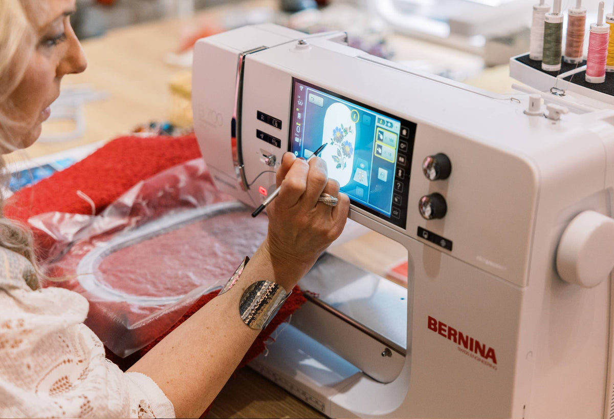 BERNINA 700 PRO close-up of embroidery touchscreen controls and hooped project