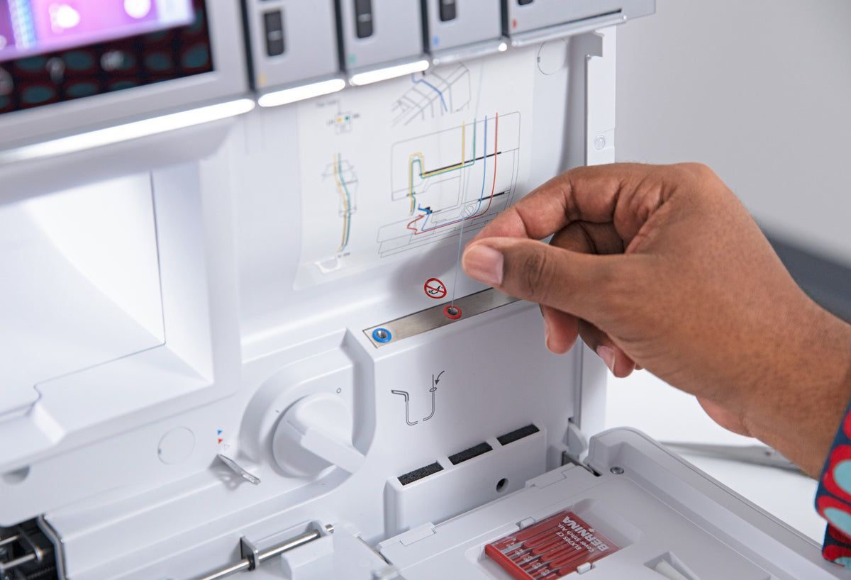 BERNINA L860 Serger air-threading controls and looper-area close-up