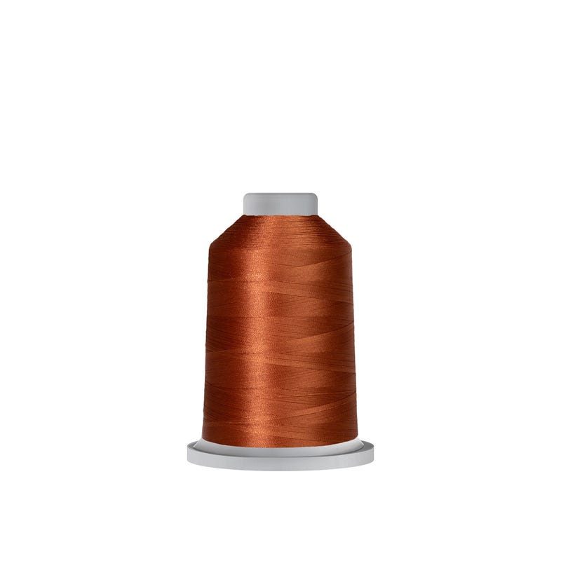 Glide 40 wt. polyester thread in Gold Brown (#26657), 1000m spool by Fil-Tec