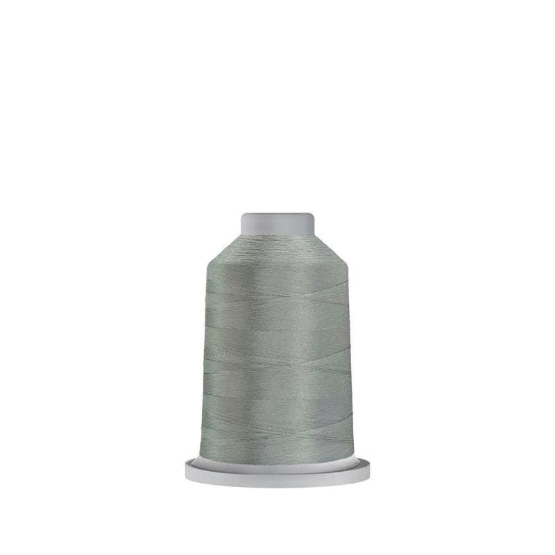 Glide 40 wt. polyester thread in Light Grey (#17543), 1000m spool by Fil-Tec