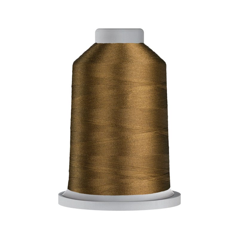 Glide 40 wt. polyester thread in Brass (#27559), 5000m spool by Fil-Tec