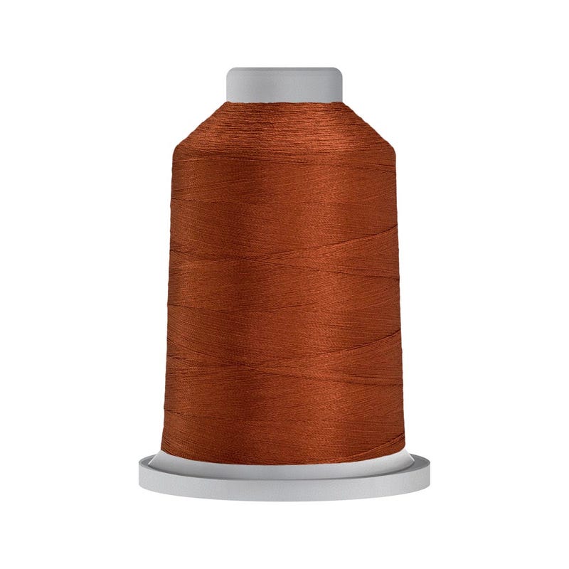 Glide 40 wt. polyester thread in Burnt Orange (#51675), 5000m spool by Fil-Tec