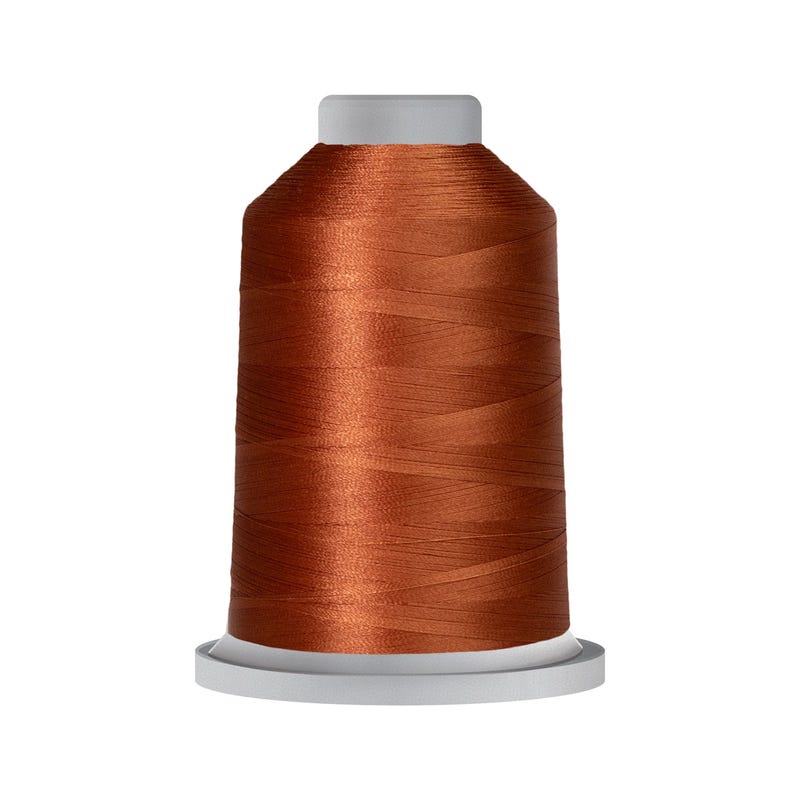 Glide 40 wt. polyester thread in Gold Brown (#26657), 5000m spool by Fil-Tec