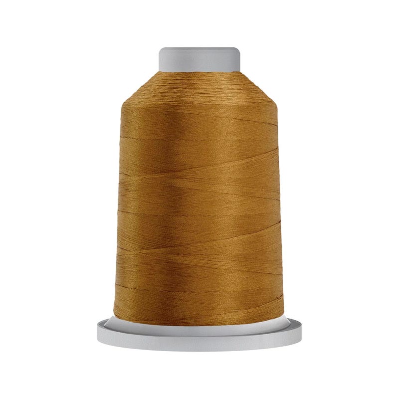 Glide 40 wt. polyester thread in Honey Gold (#80125), 5000m spool by Fil-Tec