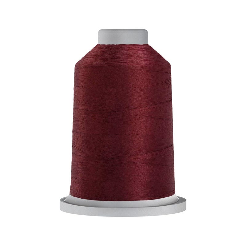 Glide 40 wt. polyester thread in Maroon (#70209), 5000m spool by Fil-Tec