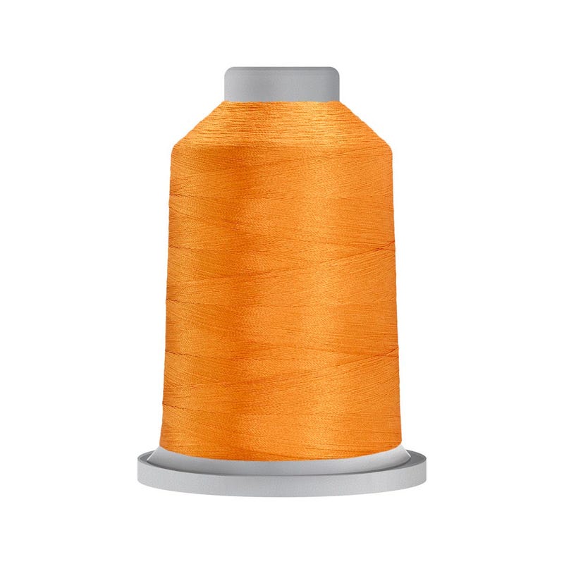 Glide 40 wt. polyester thread in Pumpkin Seed (#51365), 5000m spool by Fil-Tec