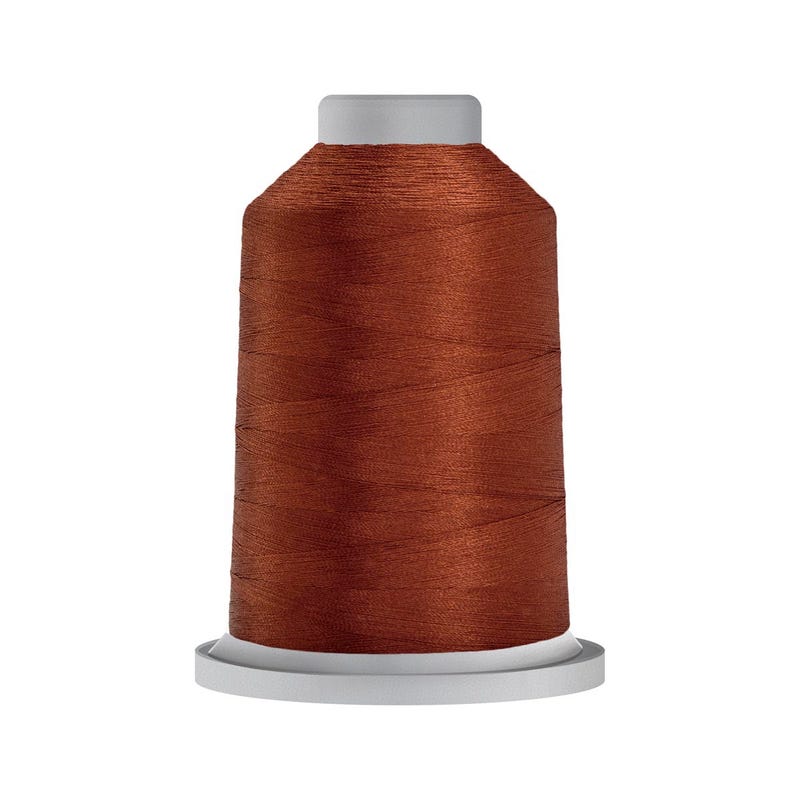 Glide 40 wt. polyester thread in Rust (#50174), 5000m spool by Fil-Tec