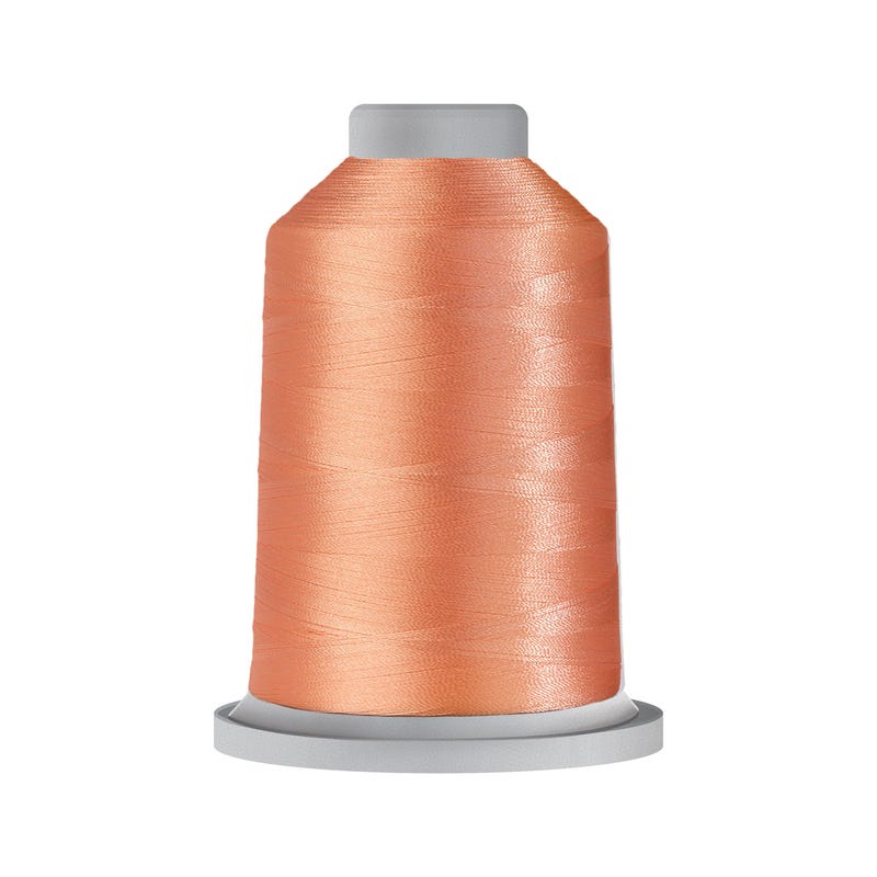Glide 40 wt. polyester thread in Sunkissed Peach (#70984), 5000m spool by Fil-Tec