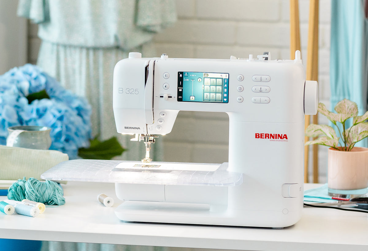 BERNINA 325 (Gen 2) sewing studio view with slide-on table