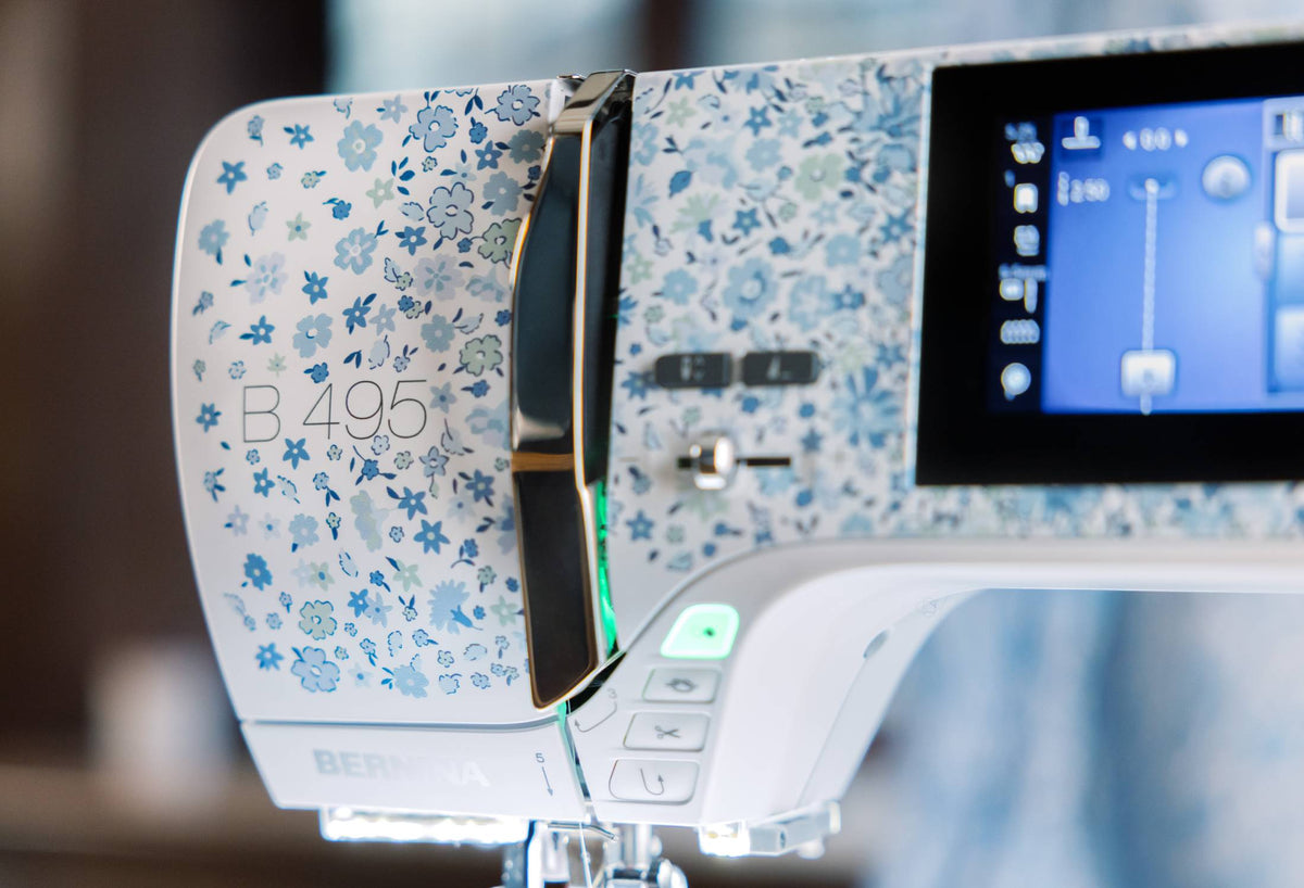 BERNINA 495 Liberty Edition - Liberty floral faceplate and touchscreen angled close-up