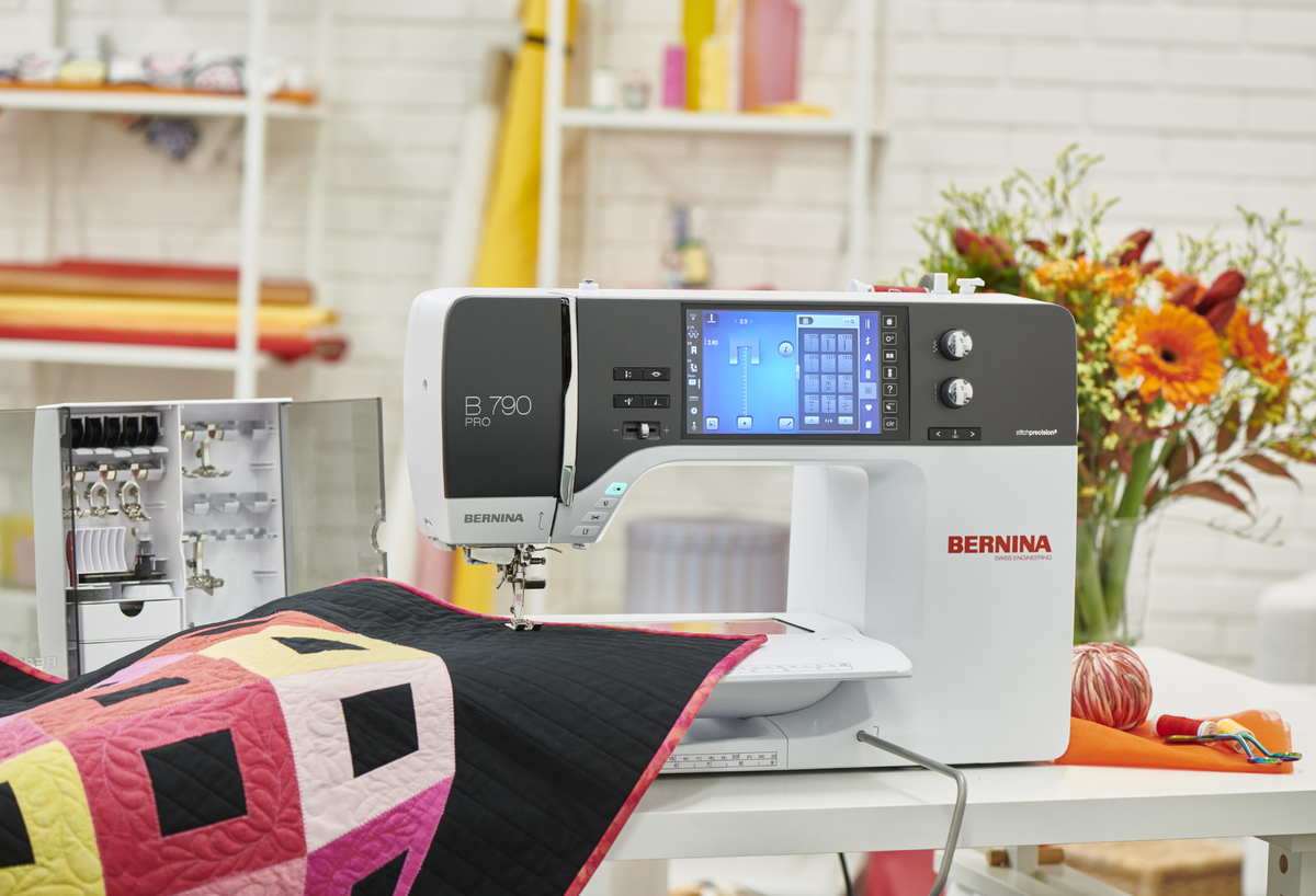 BERNINA 790 PRO quilting setup with slide-on table; fabric project shown for inspiration