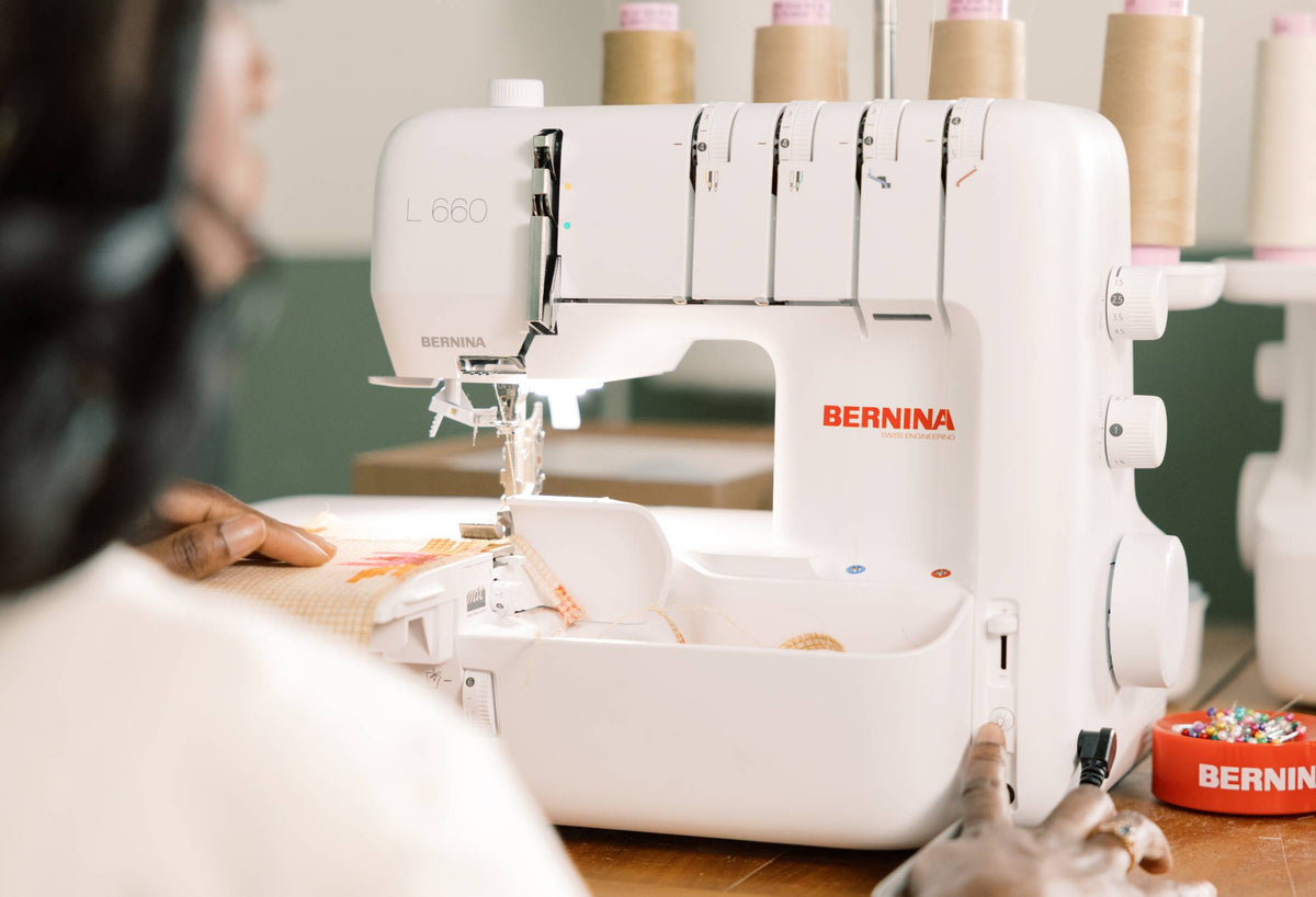 BERNINA L660 Serger front close view of air-threading controls and needle area