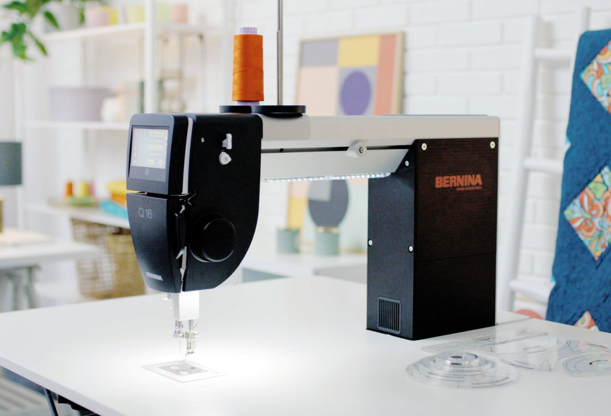 Representative BERNINA Q-Series sit-down machine close-up; machine and accessories may differ from selected Q16 PLUS package